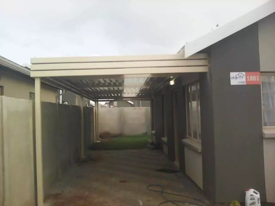 Cream carport on the side of a house