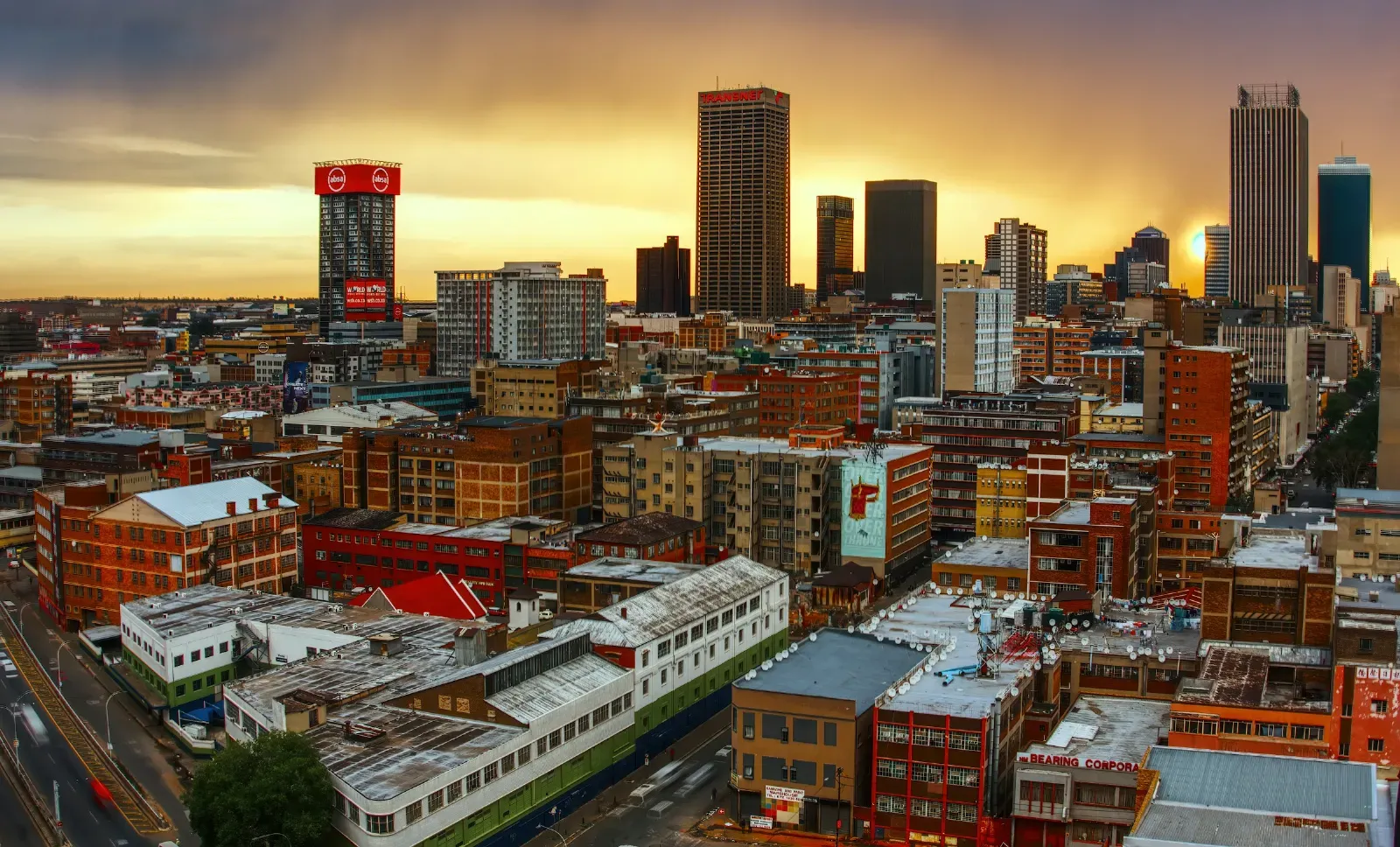 Dense CBD rooftops of Johannesburg in late-afternoon light